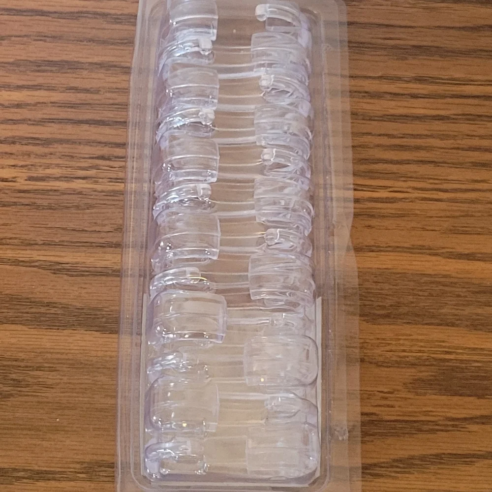 Better Home 12 plastic C-shaped shower curtain ring hooks.